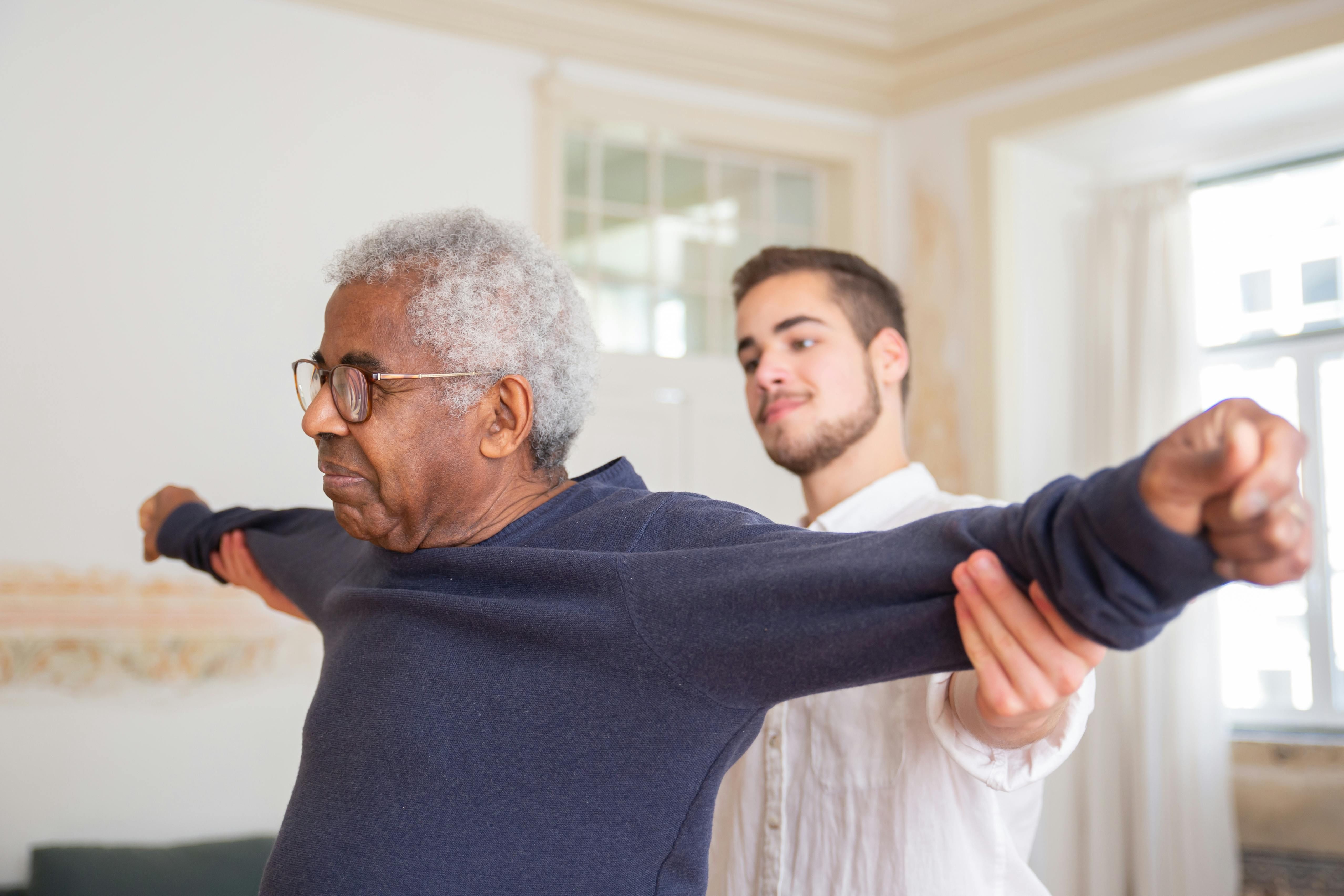Resident in physical therapy session at The Waters of Georgetown